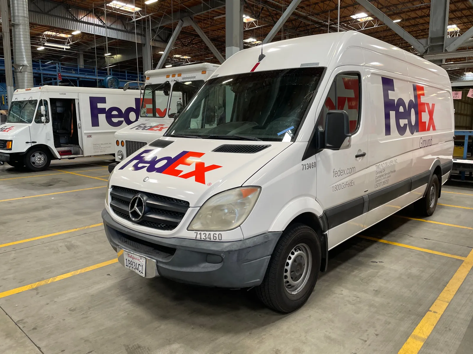 Delivery van with fleet graphics installed by High Tech Vinyl